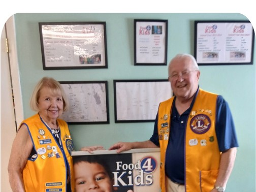 Diane and John Renyhart delivering Food 4 Kids donations